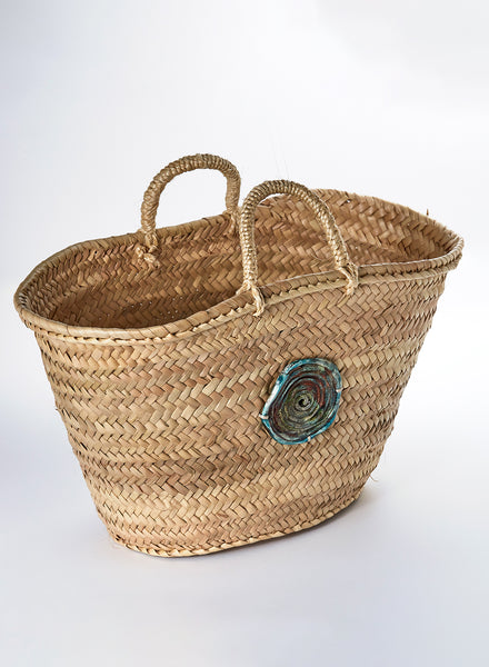 Borsa in palma naturale con accessorio-gioiello in ceramica Raku
