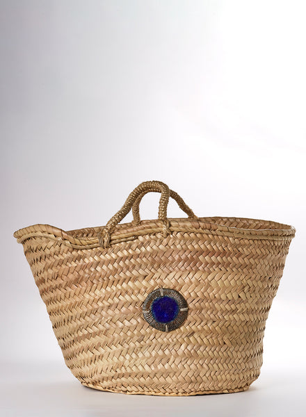 borsa intrecciata in paglia con gioiello in ceramica Raku