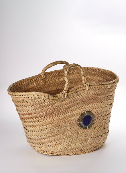 borsa intrecciata in paglia con gioiello in ceramica Raku